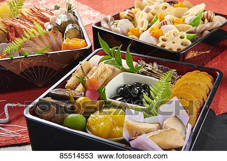 Stock Image - Japanese New Year traditional Osechi dishes. Fotosearch