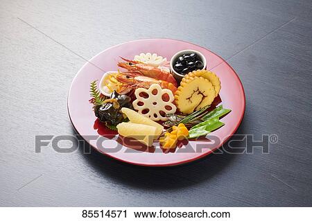 Stock Image - Japanese New Year traditional Osechi dishes. Fotosearch