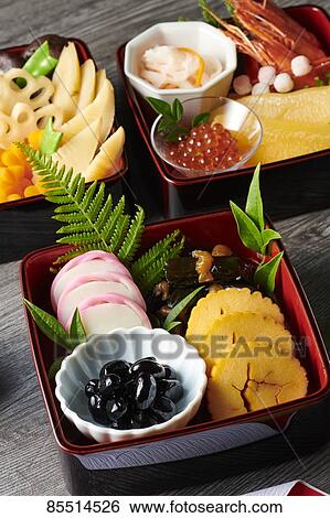 Stock Photograph - Japanese New Year traditional Osechi dishes. Fotosearch