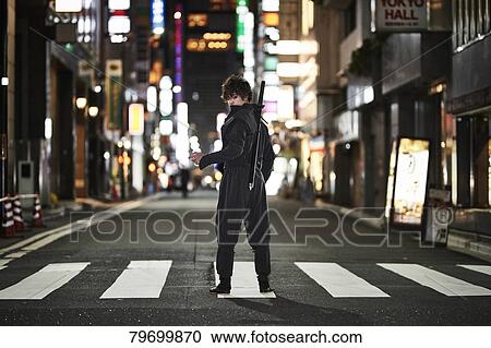 Japanese ninja at night downtown Tokyo View Large Photo Image Stock Image - Japanese ninja at night downtown Tokyo. Fotosearch