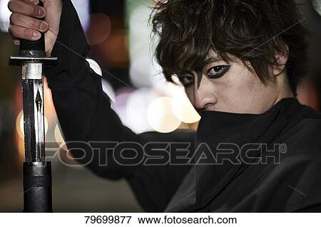 Japanese ninja at night downtown Tokyo View Large Photo Image Stock Photo - Japanese ninja at night downtown Tokyo. Fotosearch
