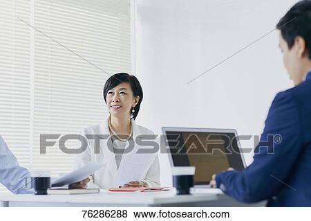 Japanese senior businesswoman having meeting in the office View Large Photo Image Stock Photo - Japanese senior businesswoman having meeting in the office. Fotosearch