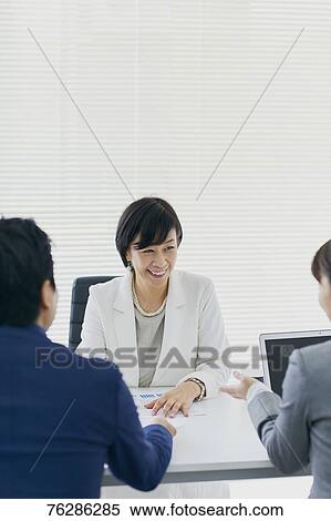 Japanese senior businesswoman having meeting in the office View Large Photo Image Stock Photography - Japanese senior businesswoman having meeting in the office. Fotosearch