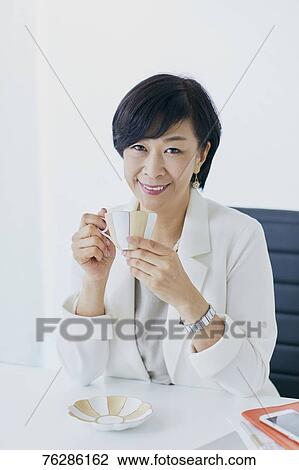 Japanese senior businesswoman in the office View Large Photo Image Stock Image - Japanese senior businesswoman in the office. Fotosearch