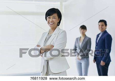 Japanese senior businesswoman with her team View Large Photo Image Stock Photo - Japanese senior businesswoman with her team. Fotosearch