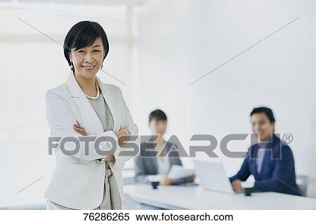 Japanese senior businesswoman with her team View Large Photo Image Stock Photography - Japanese senior businesswoman with her team. Fotosearch