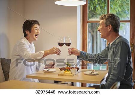 Stock Photo - Japanese senior couple dining. Fotosearch