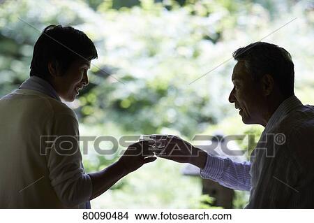 Japanese senior couple having fun at traditional inn View Large Photo Image Picture - Japanese senior couple having fun at traditional inn. Fotosearch