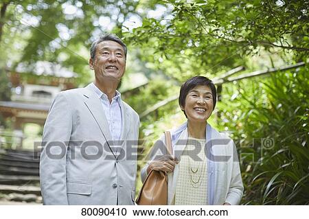 Japanese senior couple having fun at traditional inn View Large Photo Image Stock Image - Japanese senior couple having fun at traditional inn. Fotosearch
