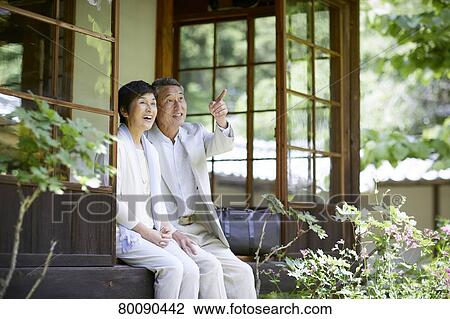 Japanese senior couple having fun at traditional inn View Large Photo Image Stock Image - Japanese senior couple having fun at traditional inn. Fotosearch