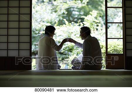 Japanese senior couple having fun at traditional inn View Large Photo Image Stock Image - Japanese senior couple having fun at traditional inn. Fotosearch