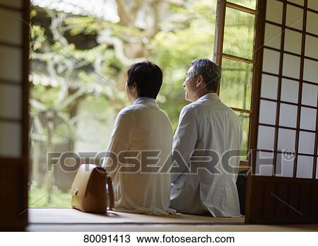 Japanese senior couple having fun at traditional inn View Large Photo Image Stock Image - Japanese senior couple having fun at traditional inn. Fotosearch