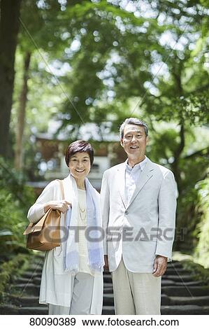 Japanese senior couple having fun at traditional inn View Large Photo Image Stock Photo - Japanese senior couple having fun at traditional inn. Fotosearch