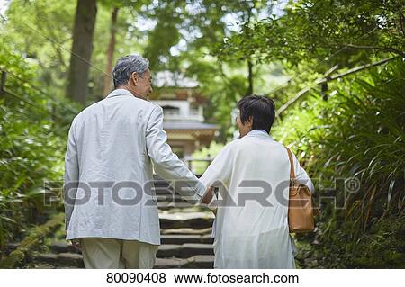 Japanese senior couple having fun at traditional inn View Large Photo Image Stock Photo - Japanese senior couple having fun at traditional inn. Fotosearch