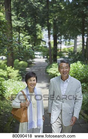 Japanese senior couple having fun at traditional inn View Large Photo Image Stock Photo - Japanese senior couple having fun at traditional inn. Fotosearch