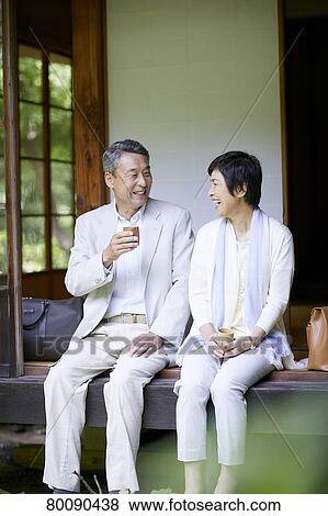 Japanese senior couple having fun at traditional inn View Large Photo Image Stock Photo - Japanese senior couple having fun at traditional inn. Fotosearch
