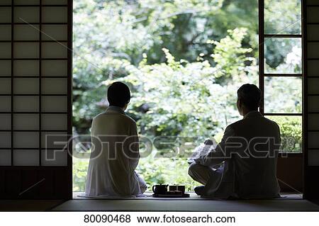 Japanese senior couple having fun at traditional inn View Large Photo Image Stock Photo - Japanese senior couple having fun at traditional inn. Fotosearch