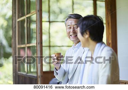 Japanese senior couple having fun at traditional inn View Large Photo Image Stock Photograph - Japanese senior couple having fun at traditional inn. Fotosearch