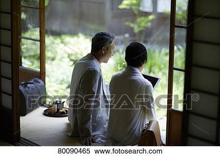Japanese senior couple having fun at traditional inn View Large Photo Image Stock Photography - Japanese senior couple having fun at traditional inn. Fotosearch