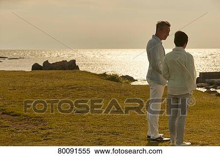 Japanese senior couple having fun by the sea View Large Photo Image Stock Photography - Japanese senior couple having fun by the sea. Fotosearch