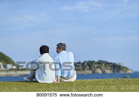 Japanese senior couple having fun by the sea View Large Photo Image Stock Photography - Japanese senior couple having fun by the sea. Fotosearch