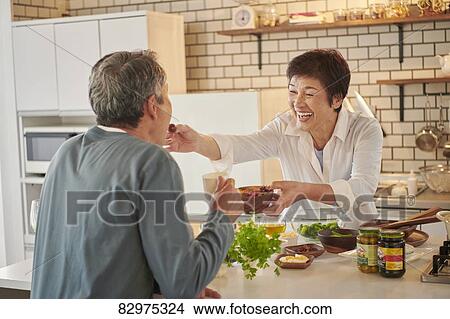 Japanese senior couple in the kitchen View Large Photo Image Picture - Japanese senior couple in the kitchen. Fotosearch