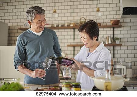 Japanese senior couple in the kitchen View Large Photo Image Picture - Japanese senior couple in the kitchen. Fotosearch