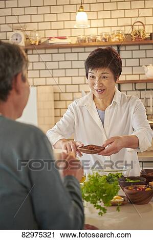 Japanese senior couple in the kitchen View Large Photo Image Stock Image - Japanese senior couple in the kitchen. Fotosearch