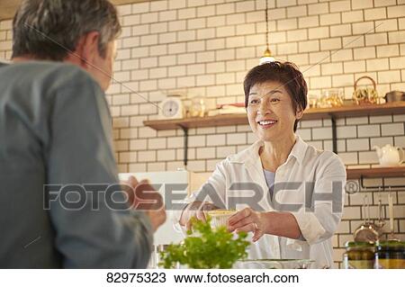 Japanese senior couple in the kitchen View Large Photo Image Stock Image - Japanese senior couple in the kitchen. Fotosearch