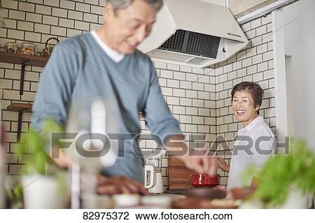 Japanese senior couple in the kitchen View Large Photo Image Stock Image - Japanese senior couple in the kitchen. Fotosearch