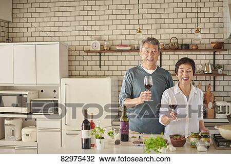 Japanese senior couple in the kitchen View Large Photo Image Stock Image - Japanese senior couple in the kitchen. Fotosearch