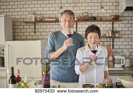 Japanese senior couple in the kitchen View Large Photo Image Stock Image - Japanese senior couple in the kitchen. Fotosearch