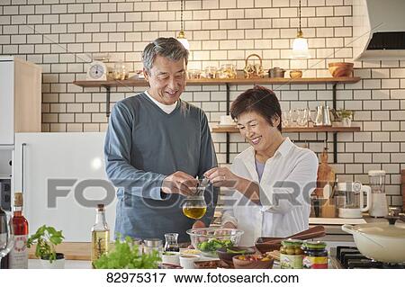 Japanese senior couple in the kitchen View Large Photo Image Stock Photo - Japanese senior couple in the kitchen. Fotosearch