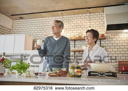 Japanese senior couple in the kitchen View Large Photo Image Stock Photo - Japanese senior couple in the kitchen. Fotosearch