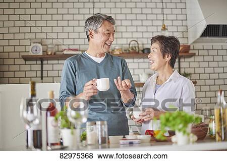 Japanese senior couple in the kitchen View Large Photo Image Stock Photo - Japanese senior couple in the kitchen. Fotosearch