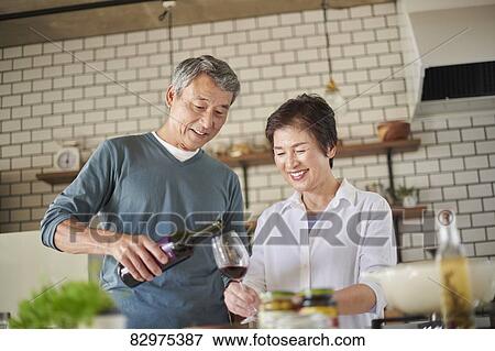 Japanese senior couple in the kitchen View Large Photo Image Stock Photo - Japanese senior couple in the kitchen. Fotosearch