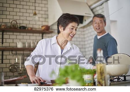 Japanese senior couple in the kitchen View Large Photo Image Stock Photograph - Japanese senior couple in the kitchen. Fotosearch