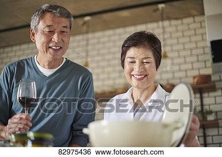 Japanese senior couple in the kitchen View Large Photo Image Stock Photograph - Japanese senior couple in the kitchen. Fotosearch