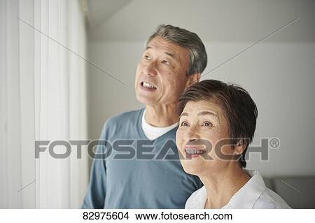 Japanese senior couple in the living room View Large Photo Image Picture - Japanese senior couple in the living room. Fotosearch