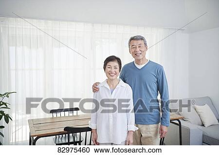 Japanese senior couple in the living room View Large Photo Image Stock Image - Japanese senior couple in the living room. Fotosearch