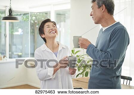 Japanese senior couple in the living room View Large Photo Image Stock Image - Japanese senior couple in the living room. Fotosearch