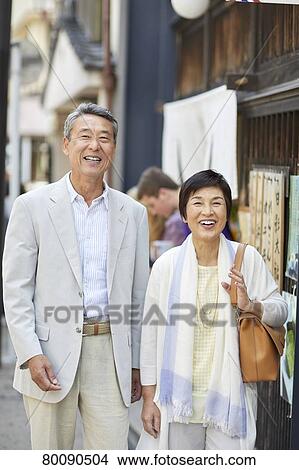Japanese senior couple shopping View Large Photo Image Picture - Japanese senior couple shopping. Fotosearch