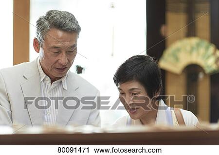 Japanese senior couple shopping View Large Photo Image Stock Image - Japanese senior couple shopping. Fotosearch