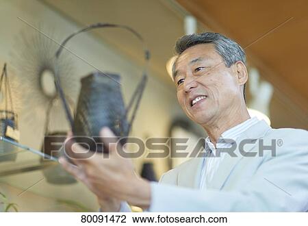 Japanese senior couple shopping View Large Photo Image Stock Image - Japanese senior couple shopping. Fotosearch