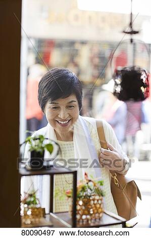 Japanese senior couple shopping View Large Photo Image Stock Photo - Japanese senior couple shopping. Fotosearch