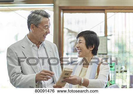 Japanese senior couple shopping View Large Photo Image Stock Photograph - Japanese senior couple shopping. Fotosearch