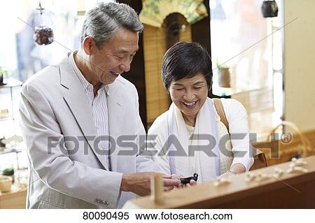 Japanese senior couple shopping View Large Photo Image Stock Photography - Japanese senior couple shopping. Fotosearch