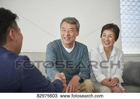Japanese senior couple talking with consultant View Large Photo Image Stock Image - Japanese senior couple talking with consultant. Fotosearch