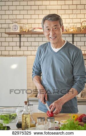 Japanese senior man in the kitchen View Large Photo Image Stock Photography - Japanese senior man in the kitchen. Fotosearch