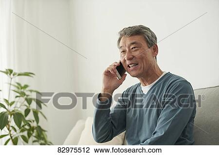 Japanese senior man on the sofa View Large Photo Image Stock Image - Japanese senior man on the sofa. Fotosearch